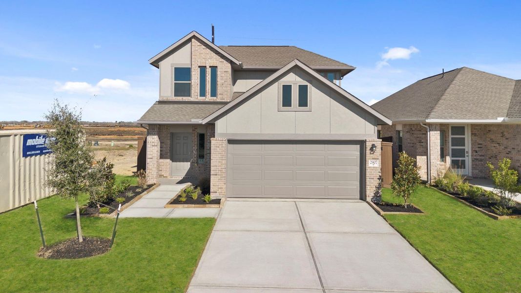 Front exterior of a new home in Creekhaven, Rosharon, TX, highlighting curb appeal (Image 18).