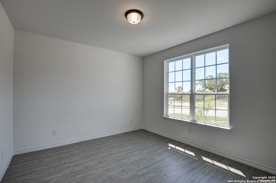 Spacious, unfurnished interior of a new home in The Reserve at Potranco Oaks, Castroville (Image 6).