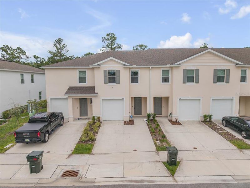 Front exterior of a new home in , Daytona Beach, FL, highlighting curb appeal (Image 23). Front exterior of a new home in , Daytona Beach, FL, highlighting curb appeal (Image 23).