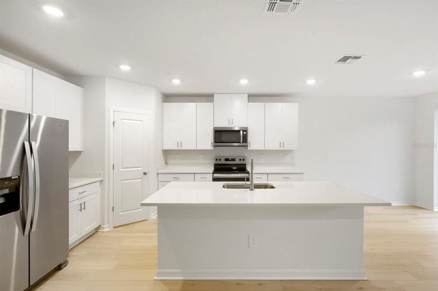 Furnished interior view inside a new home in Salt Meadows - Classic Series, Parrish (Image 14).