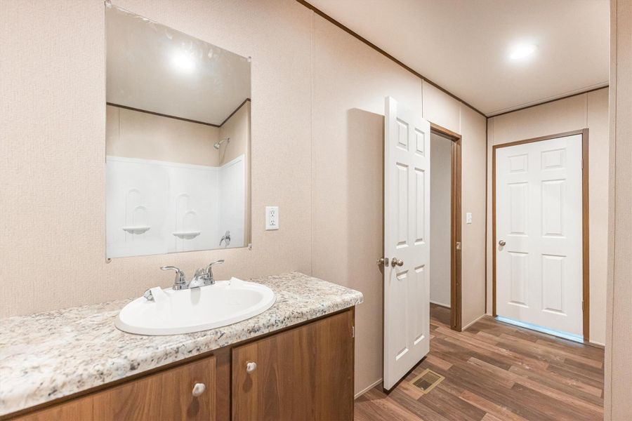 Furnished interior view inside a new home in , Conroe (Image 8).