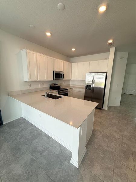 Furnished interior view inside a new home in , Davenport (Image 16). Furnished interior view inside a new home in , Davenport (Image 16).