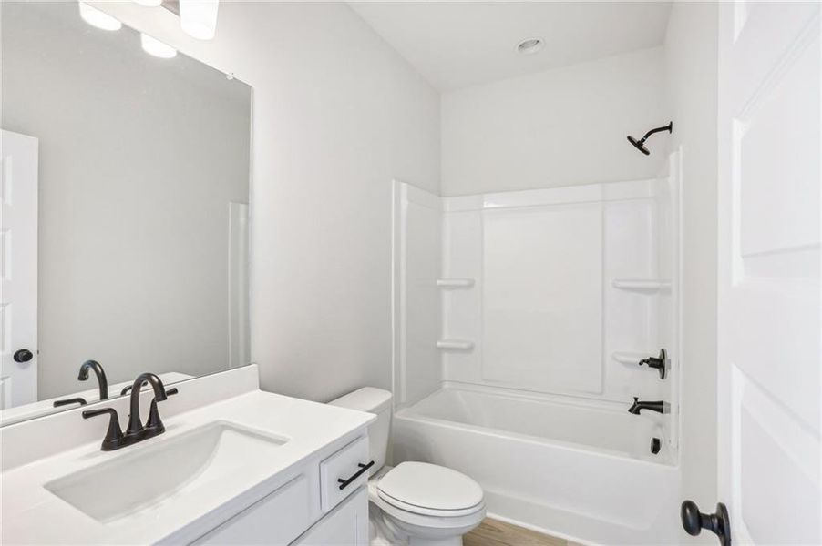 Furnished interior view inside a new home in Ponderosa Farms Reserve, Gainesville (Image 9).