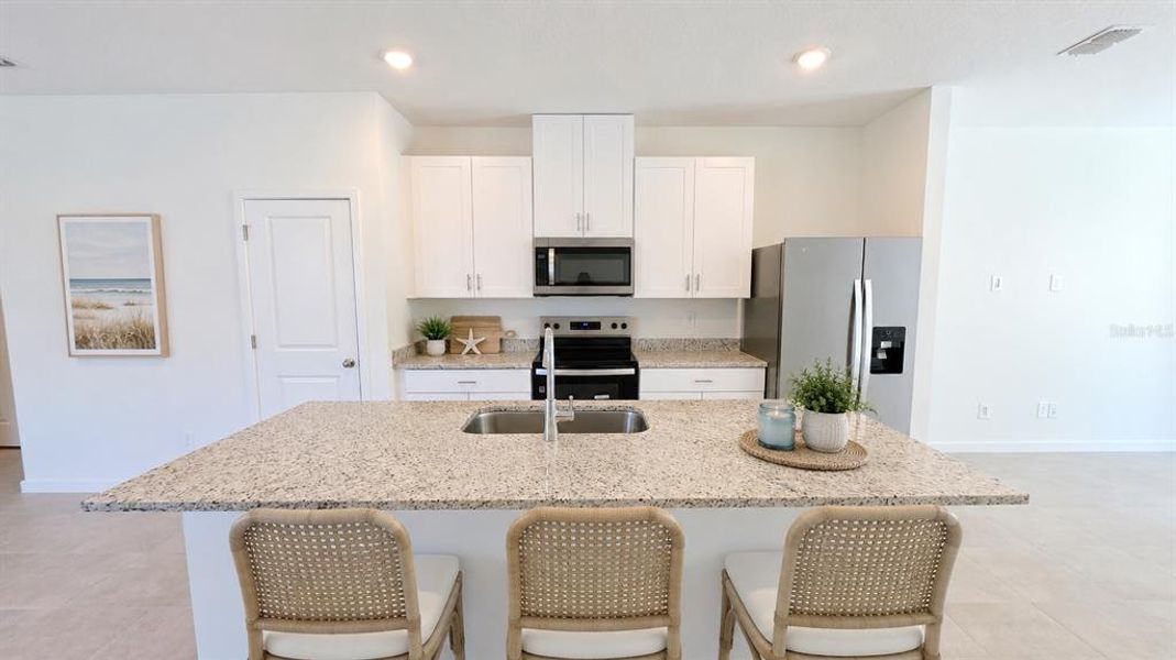 Furnished interior view inside a new home in , Palm Coast (Image 13). Furnished interior view inside a new home in , Palm Coast (Image 13).