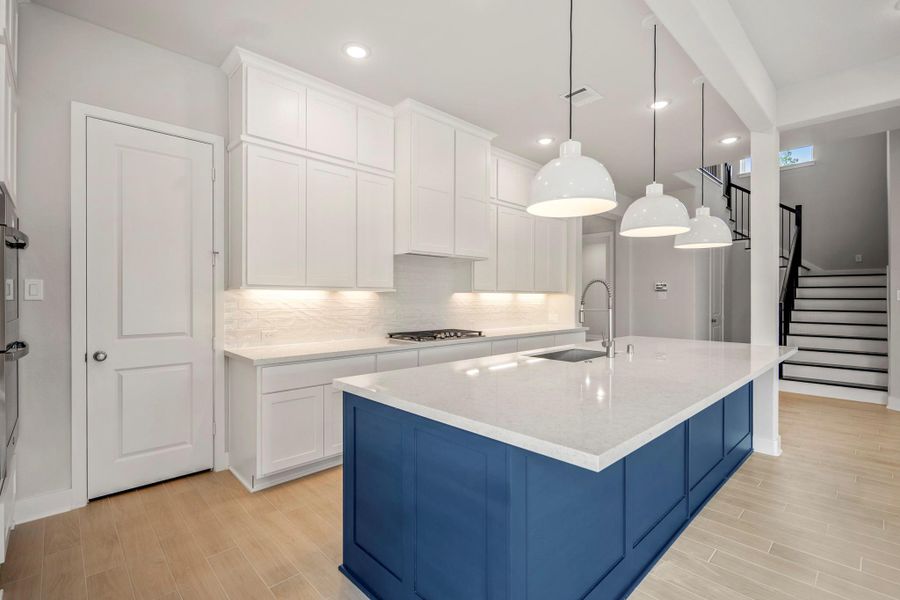 Furnished interior view inside a new home in ARTAVIA 55' Lots, Conroe (Image 9).