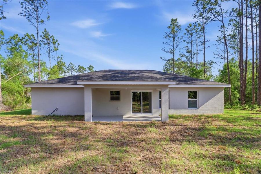 Exterior details and patio area of a home in , Citrus Springs (Image 26).