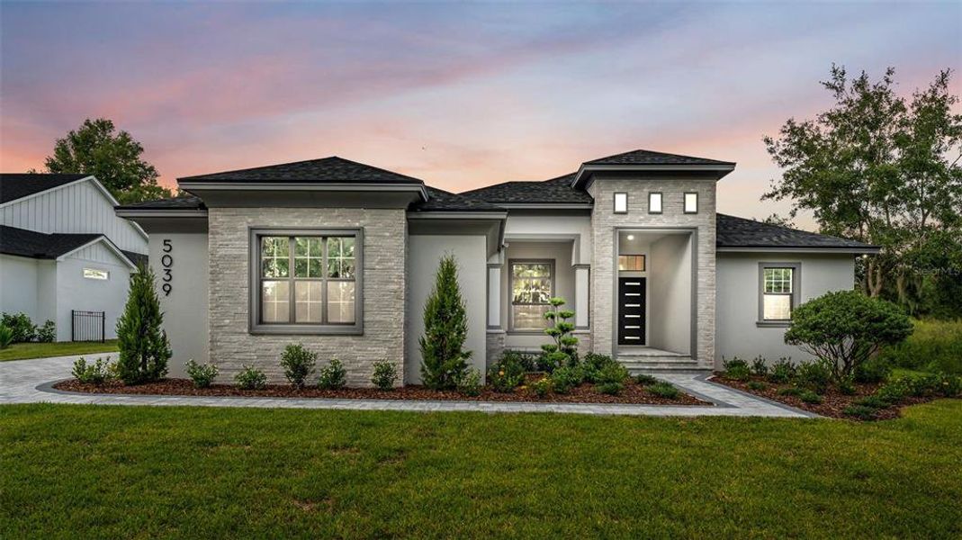 Front exterior of a new home in , Lakeland, FL, highlighting curb appeal (Image 1). Front exterior of a new home in , Lakeland, FL, highlighting curb appeal (Image 1).