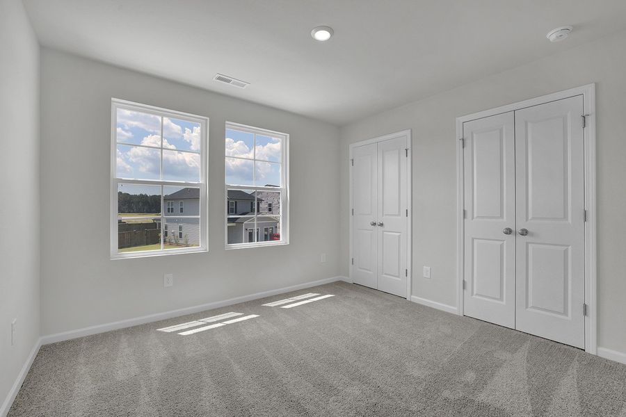 Spacious, unfurnished interior of a new home in River Tide Farms, Bolivia (Image 24).
