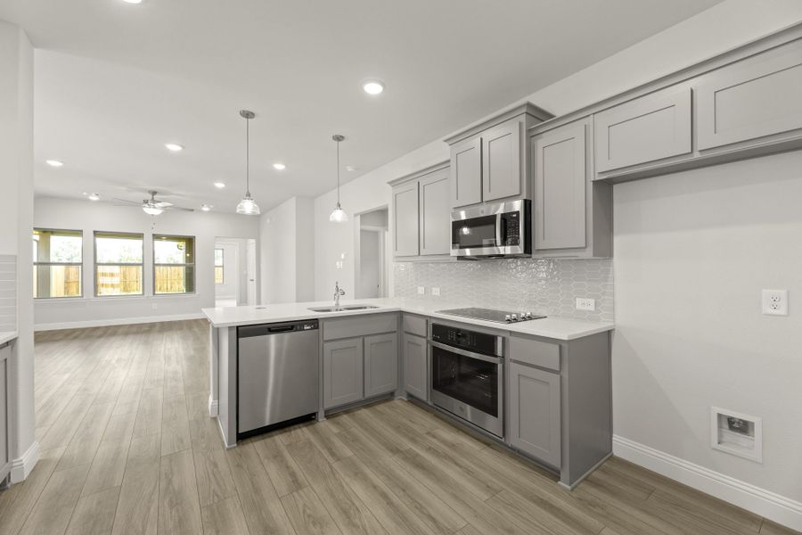 Furnished interior view inside a new home in Keeneland, Aubrey (Image 5).