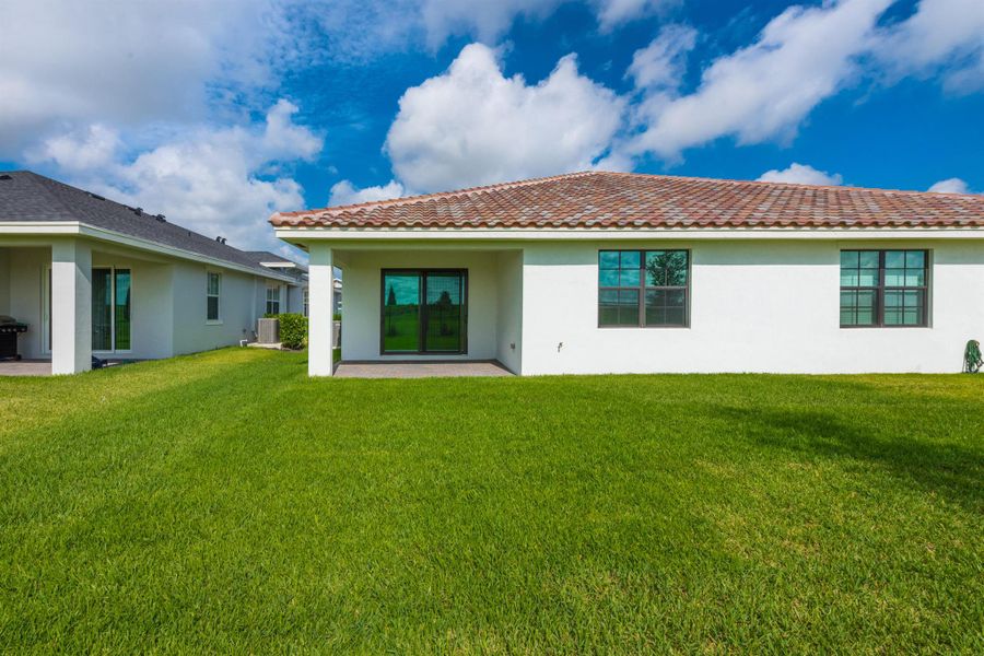 Exterior details and patio area of a home in , Loxahatchee (Image 2).