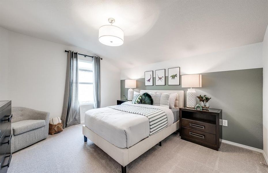 Secondary bedroom designed with generous storage solutions *Model representation