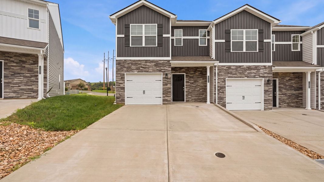 Front exterior of a new home in The Arbor Townhomes, Kingsport, TN, highlighting curb appeal (Image 16). Front exterior of a new home in The Arbor Townhomes, Kingsport, TN, highlighting curb appeal (Image 16).