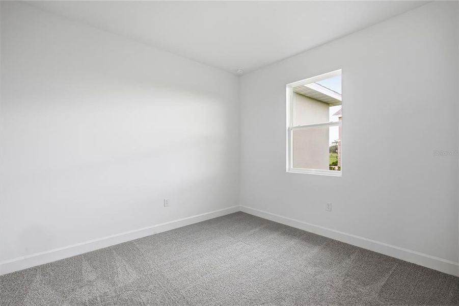 Spacious, unfurnished interior of a new home in Glen Lakes, Weeki Wachee (Image 29).