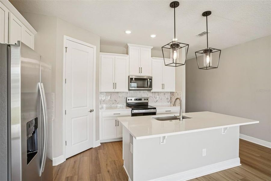 Furnished interior view inside a new home in Legends Preserve - Signature Series, Daytona Beach (Image 7).
