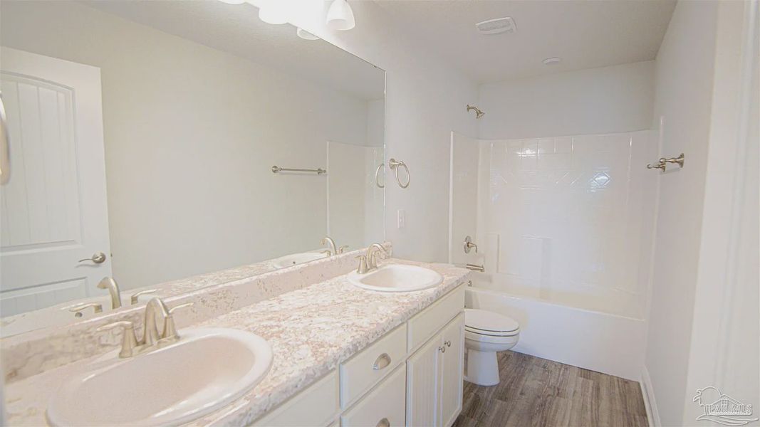 Furnished interior view inside a new home in Pine Top, Cantonment (Image 7).