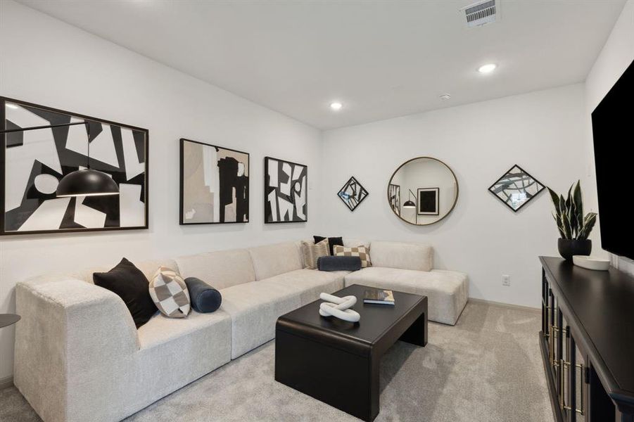 This beautiful media room offers outstanding space for you to host big game day parties or family movie nights!