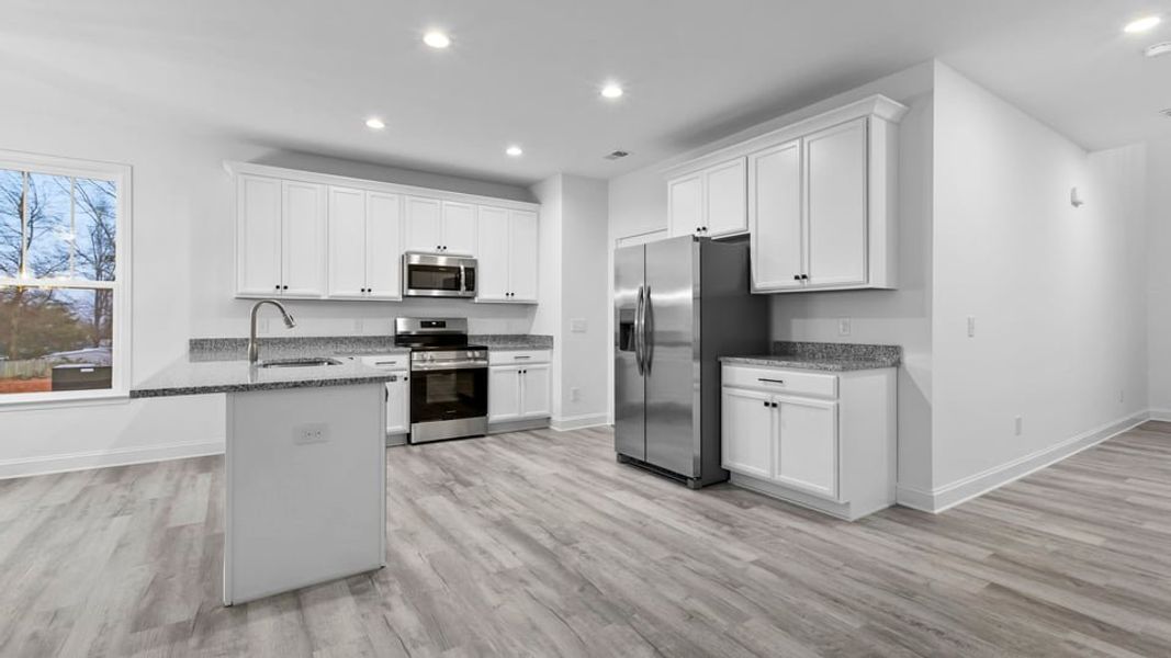 Representative furnished interior of a home built from the End Unit by D.R. Horton in Pearson Road Townhomes, Easley (Image 4).