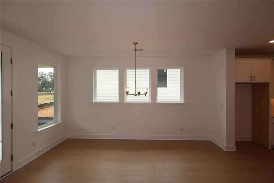 Spacious, unfurnished interior of a new home in Maple Grove at Towne Lake, Woodstock (Image 11).