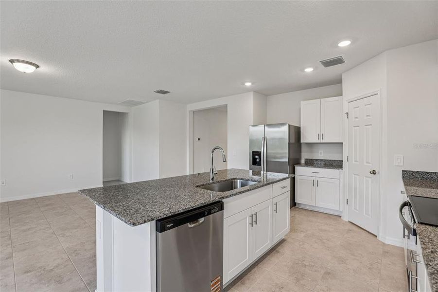 Furnished interior view inside a new home in Bradbury Creek - Signature Series, Haines City (Image 7).