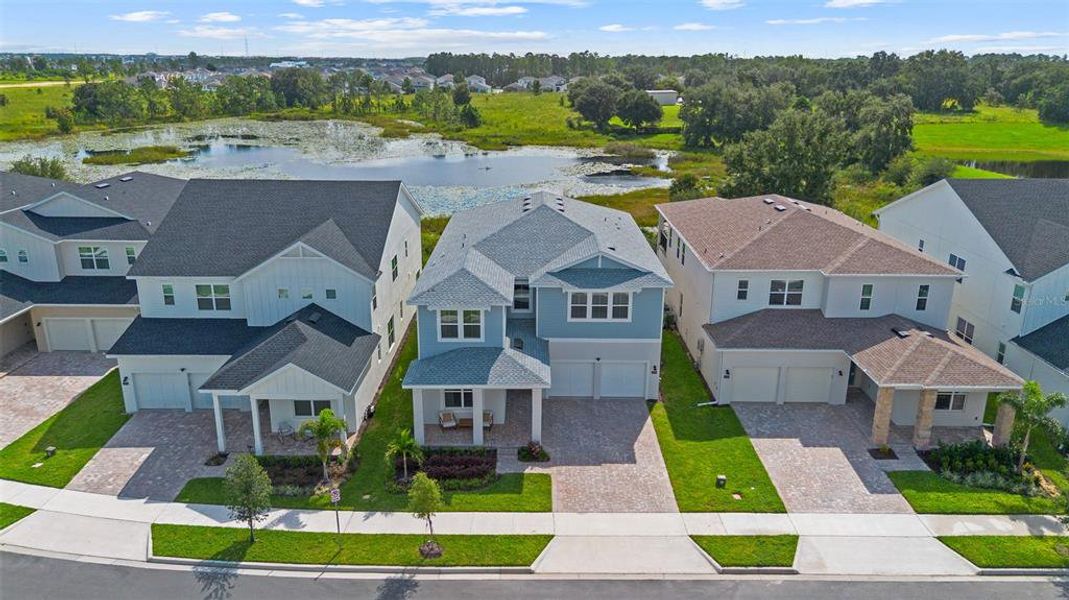 Front exterior of a new home in , Winter Garden, FL, highlighting curb appeal (Image 1). Front exterior of a new home in , Winter Garden, FL, highlighting curb appeal (Image 1).