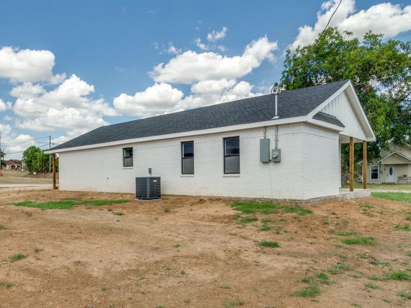 View of side of property with cooling unit View of side of property with cooling unit