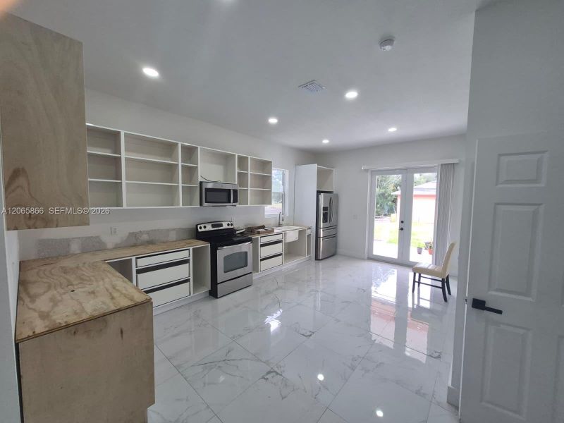 Furnished interior view inside a new home in , Clewiston (Image 5).