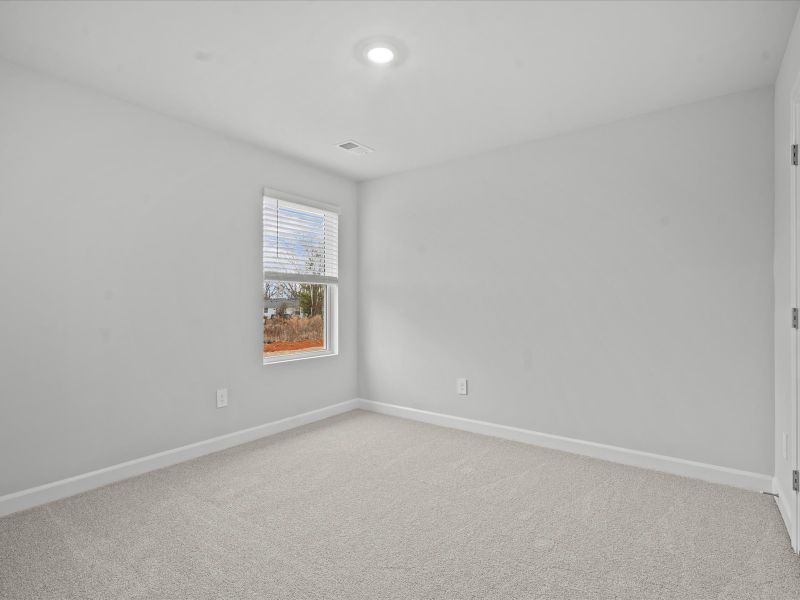 Spacious, unfurnished interior of a new home in Brayfield Manor - Signature Collection, Wellford (Image 19).