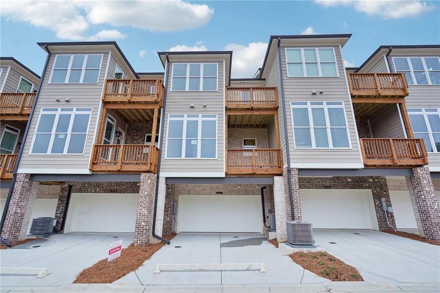 In-progress construction of a new home in Ward's Crossing Townhomes, Johns Creek, GA (Image 28).