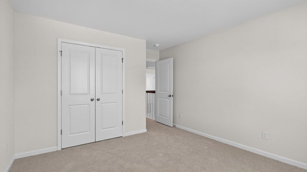 Spacious, unfurnished interior of a new home in The Estates Park, Apex (Image 25).