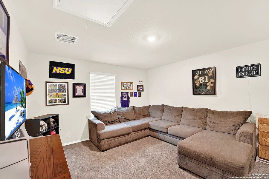 Furnished interior view inside a new home in The Links at River Bend, Floresville (Image 13).