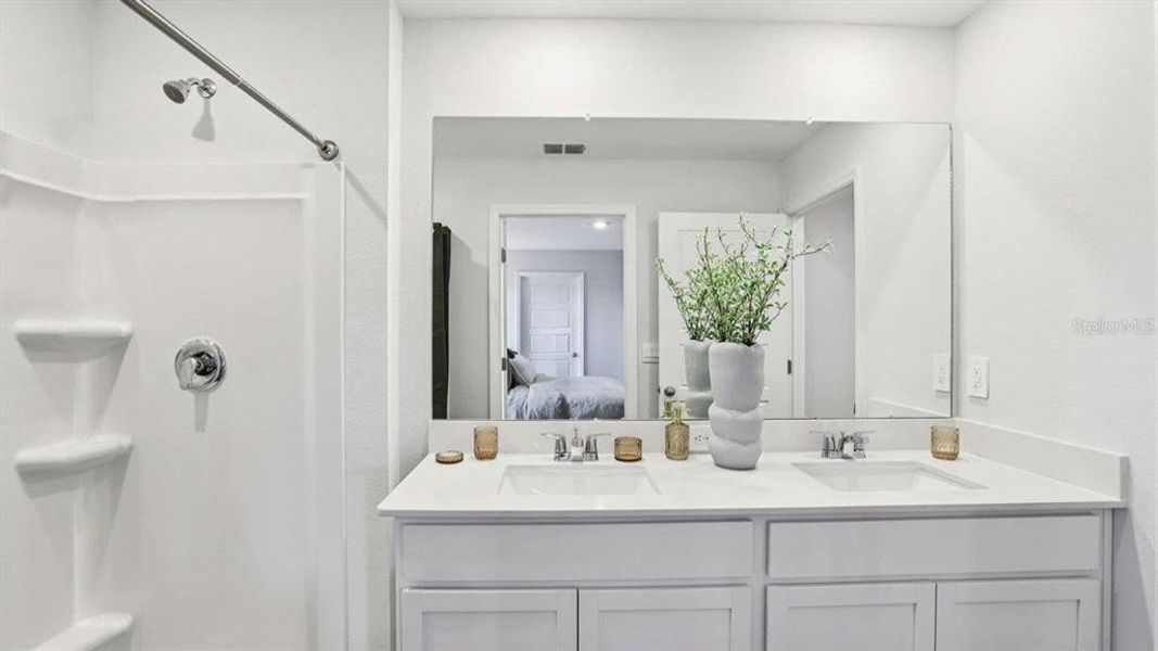 Furnished interior view inside a new home in Lake Deer Estates, Poinciana (Image 21).