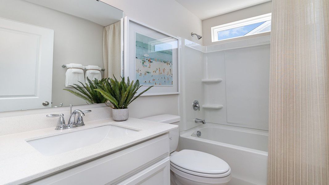 Representative furnished interior of a home built from the FORRESTER by D.R. Horton in Belle Park, North Myrtle Beach (Image 12).
