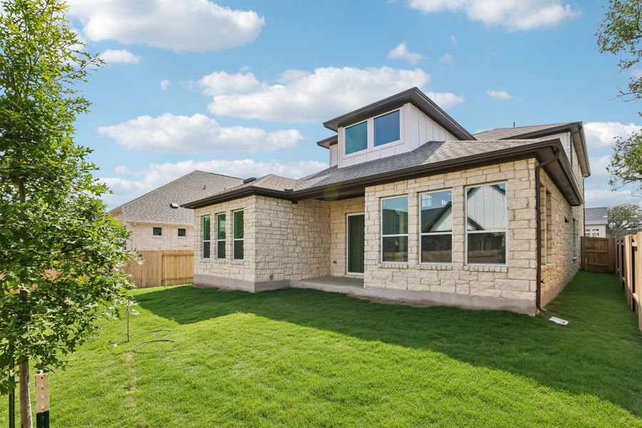 Exterior details and patio area of a home in Persimmon, Buda (Image 16). Exterior details and patio area of a home in Persimmon, Buda (Image 16).