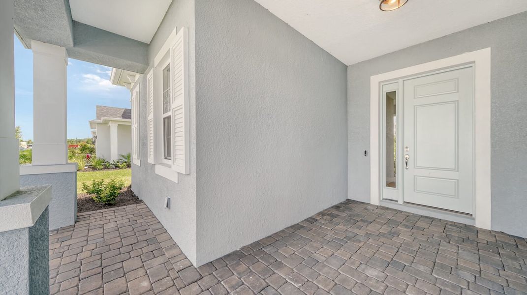 Exterior details and patio area of a home in Wildleaf at North River Ranch, Parrish (Image 4).
