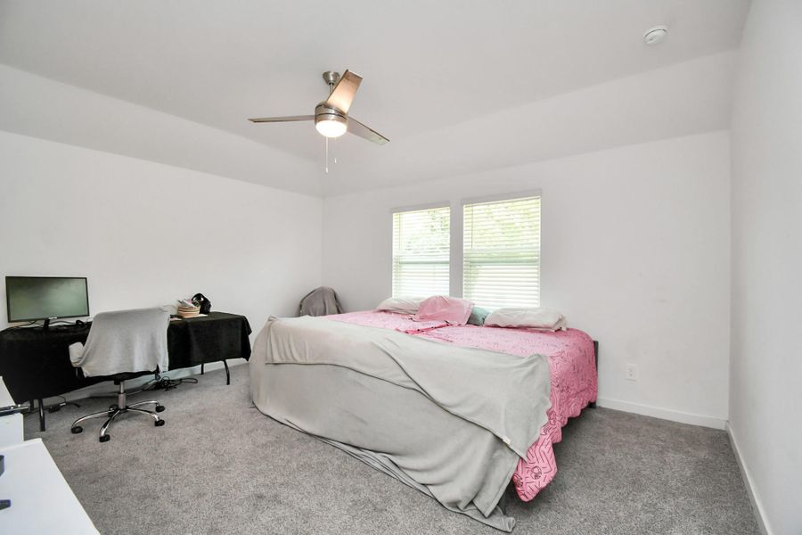 Furnished interior view inside a new home in Post Oak Pointe, Fresno (Image 23).