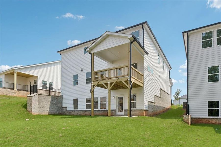 Exterior details and patio area of a home in Martin Springs - Estate Series, Lawrenceville (Image 28).
