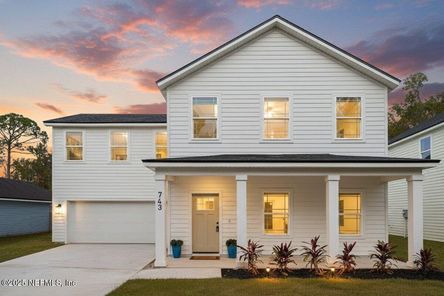 Front exterior of a new home in , Fleming Island, FL, highlighting curb appeal (Image 2).
