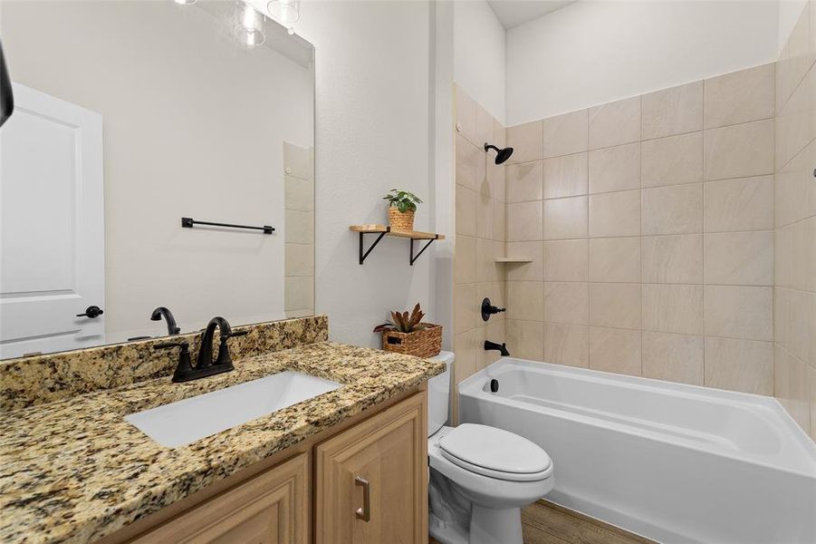 Bathroom with shower / bathtub combination and vanity Bathroom with shower / bathtub combination and vanity