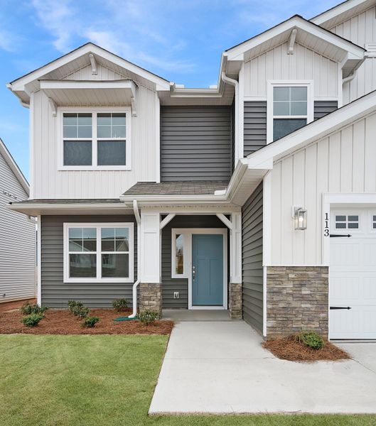 Representative exterior photo of a completed home built from the The McKee Manor by Cothran Homes in Holly Ridge, Greenville, SC (Image 28). Representative exterior photo of a completed home built from the The McKee Manor by Cothran Homes in Holly Ridge, Greenville, SC (Image 28).