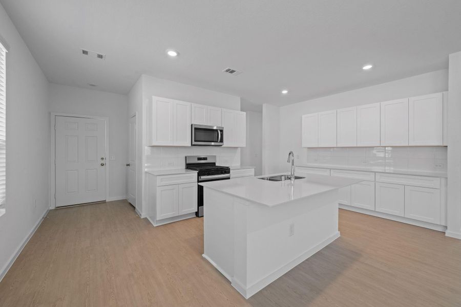 Furnished interior view inside a new home in Crosby Farms, Crosby (Image 6).