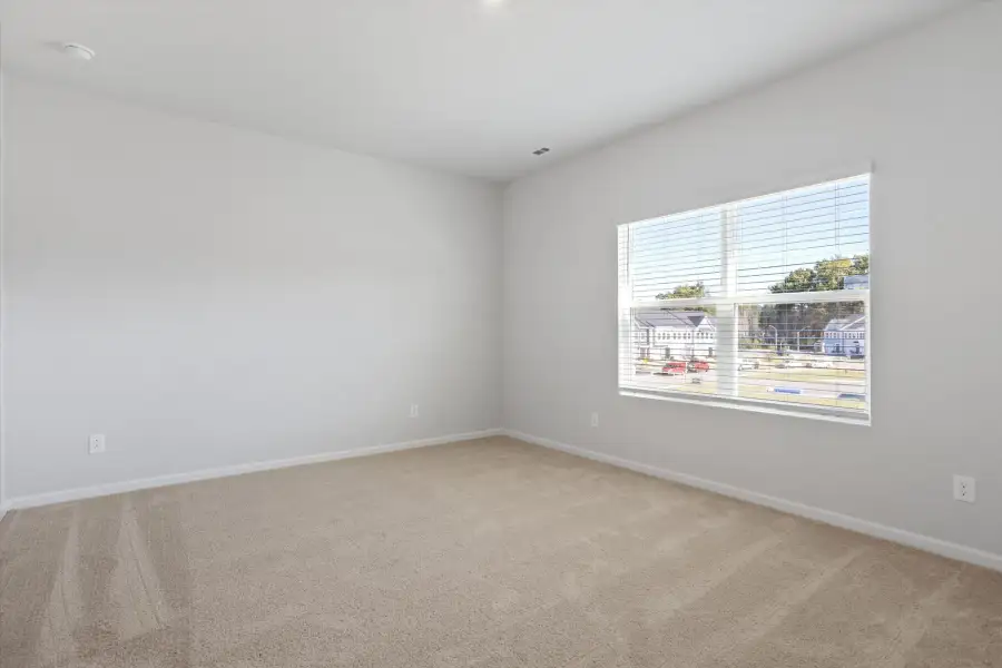 Spacious, unfurnished interior of a new home in West Main Townhomes, Sanford (Image 18).