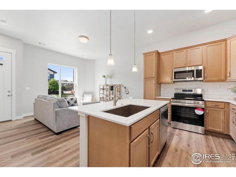 Furnished interior view inside a new home in The Lakes at Centerra - Discovery, Loveland (Image 7).