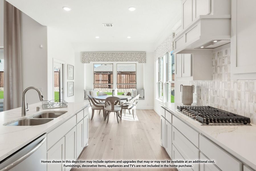 White kitchen with quartz countertops, gas cooktop, tile backsplash, and breakfast nook with large windows White kitchen with quartz countertops, gas cooktop, tile backsplash, and breakfast nook with large windows