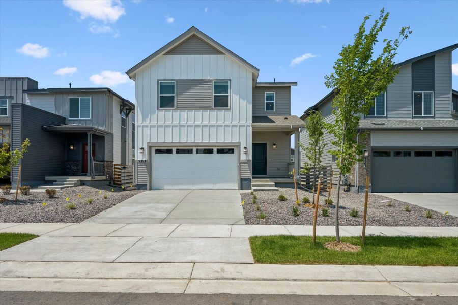 Front exterior of a new home in Legato, Commerce City, CO, highlighting curb appeal (Image 1). Front exterior of a new home in Legato, Commerce City, CO, highlighting curb appeal (Image 1).