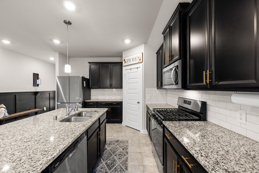 Furnished interior view inside a new home in Sierra Vista, Iowa Colony (Image 29).