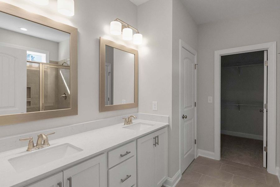 Representative furnished interior of a home built from the Garland by Caviness & Cates Communities in Bartlett Manor, Youngsville (Image 226). Representative furnished interior of a home built from the Garland by Caviness & Cates Communities in Bartlett Manor, Youngsville (Image 226).