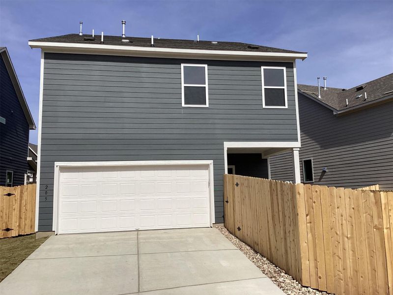 Exterior details and patio area of a home in Lariat, Liberty Hill (Image 3).