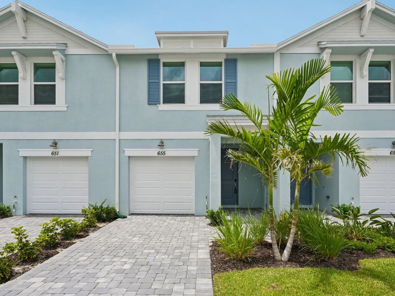 Front exterior of a new home in Tidewater, Fort Pierce, FL, highlighting curb appeal (Image 1). Front exterior of a new home in Tidewater, Fort Pierce, FL, highlighting curb appeal (Image 1).