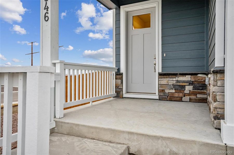 Exterior details and patio area of a home in The Ridge at Lorson Ranch, Colorado Springs (Image 22).