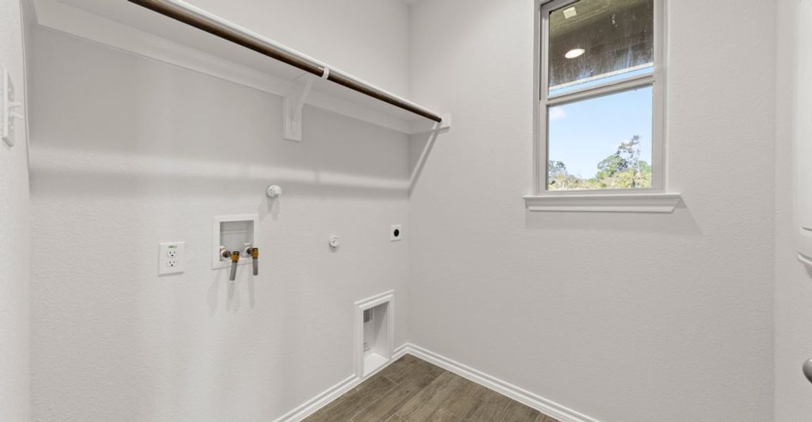 Representative exterior photo of a completed home built from the Raleigh by Impression Homes in Keeneland, Aubrey, TX (Image 22). Representative exterior photo of a completed home built from the Raleigh by Impression Homes in Keeneland, Aubrey, TX (Image 22).